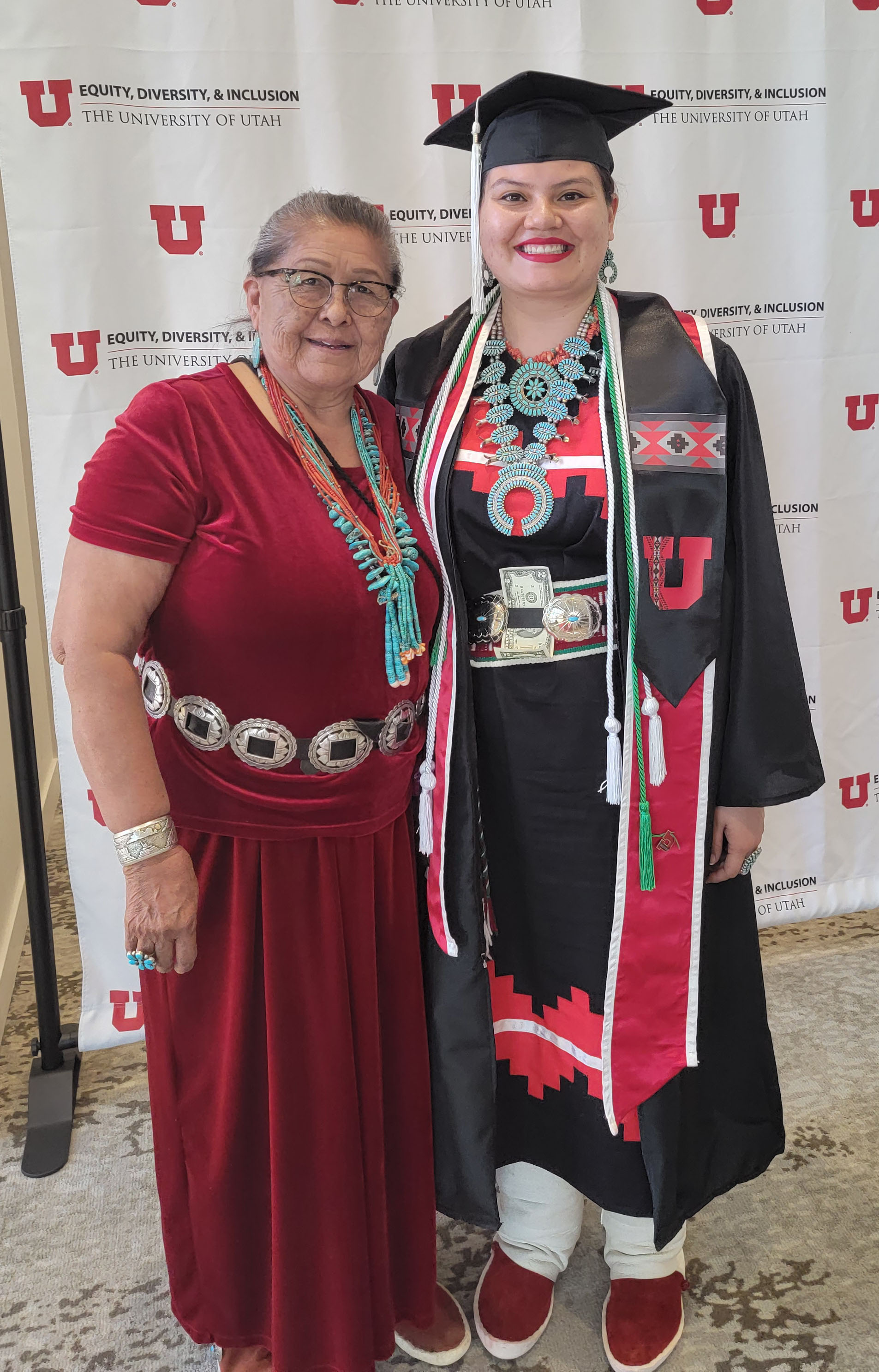 Graduation photo of Nizhoni with her mother