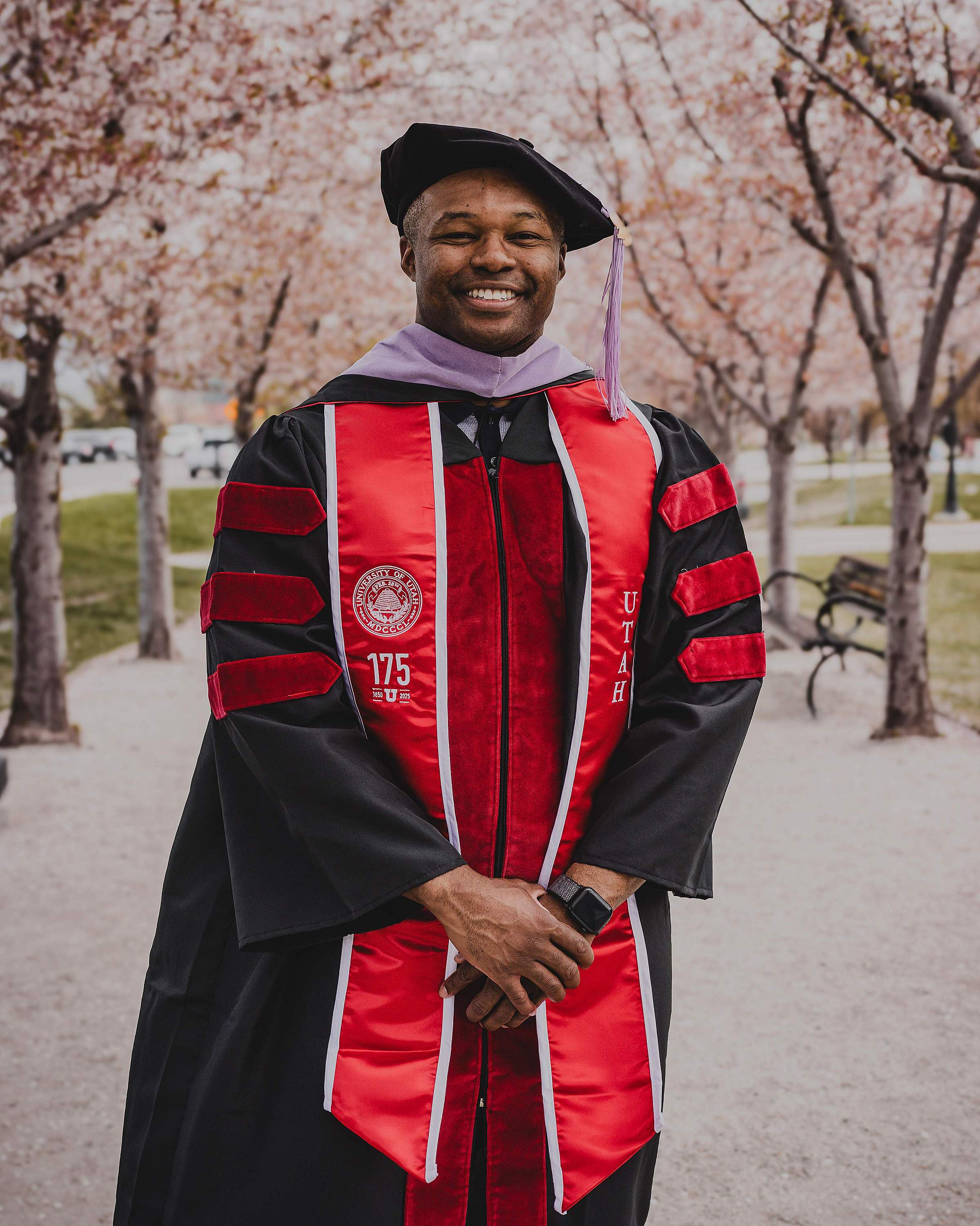 Chinedu in graduation regalia